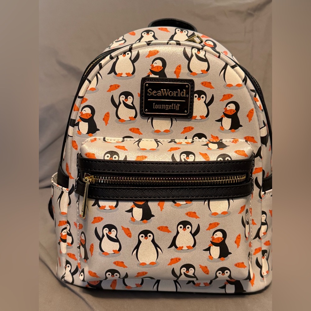 Loungefly Black and Orange Penguin Backpack from SeaWorld